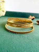 Load image into Gallery viewer, Twisted Love Gold Bangle Set Of Two